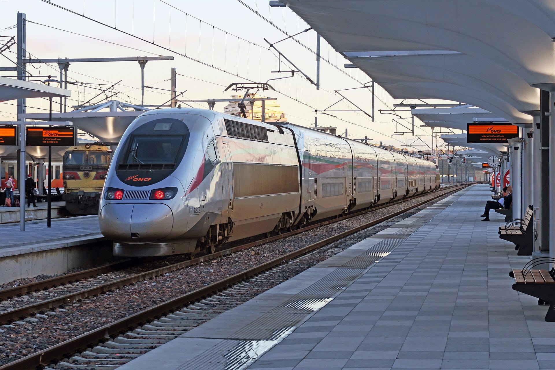 An ONCF Al Boraq high-speed train waiting at the platform at Tanger Ville station, with an older Moroccan train alongside