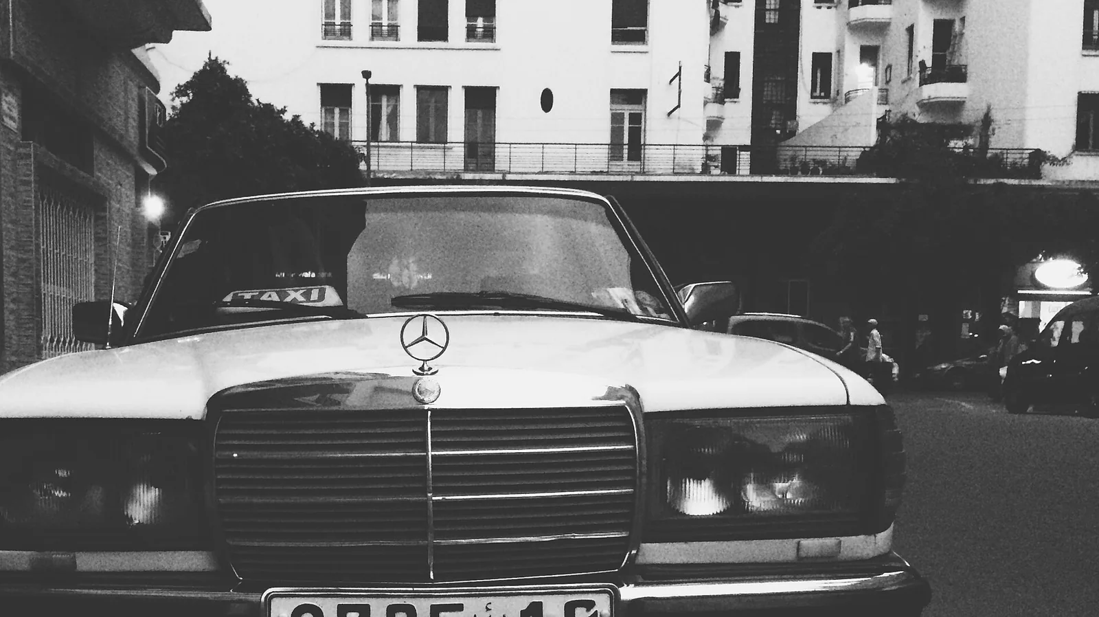 A grand taxi waiting for passengers in central Casablanca, the shared six-seat cars that run fixed intercity routes in Morocco