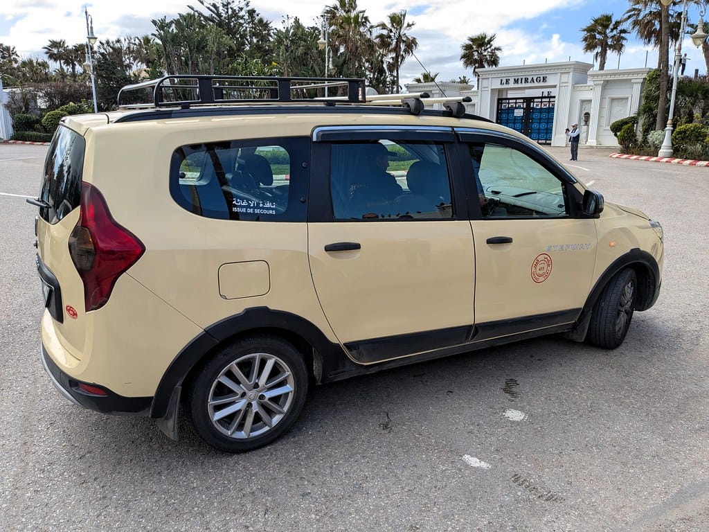 A Moroccan grand taxi: the shared six-seat car that sells places, not rides