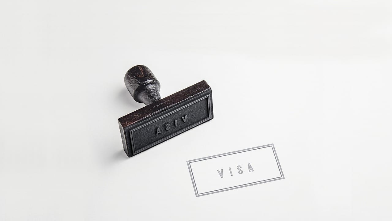 Passport open to a visa stamp page, where the morocco visa requirements come down to this stamp